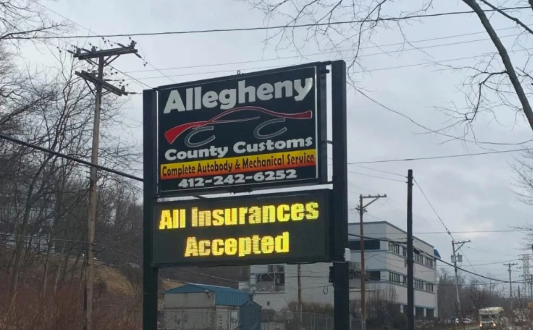 ACC roadside sign on Rodi Road with the LED message “All Insurances Accepted”