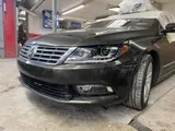 Volkswagen CC with front corner damage in the shop