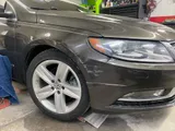 Close view of the refinished fender and bumper on the VW CC