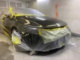 Volkswagen CC front end masked in plastic for paint